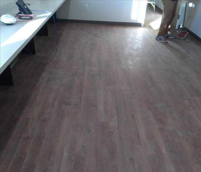 image of commercial floor with winter elements making the floors appear dark and dirty