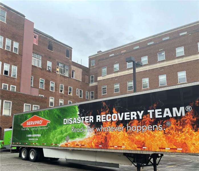 servpro truck in front of commercial building